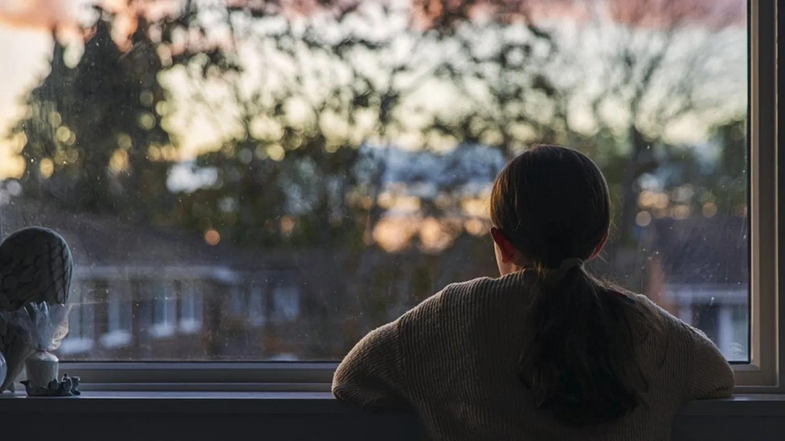 Tetiana Kotelnykova looking out a window